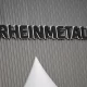 Логотип Rheinmetall у день відкриття нового артилерійського заводу компанії у місті Унтерлюсс, Німеччина, 27 серпня 2025 року / Фото: Reuters